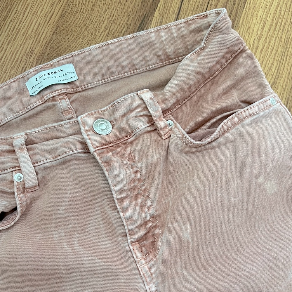 Distressed pink denim pants